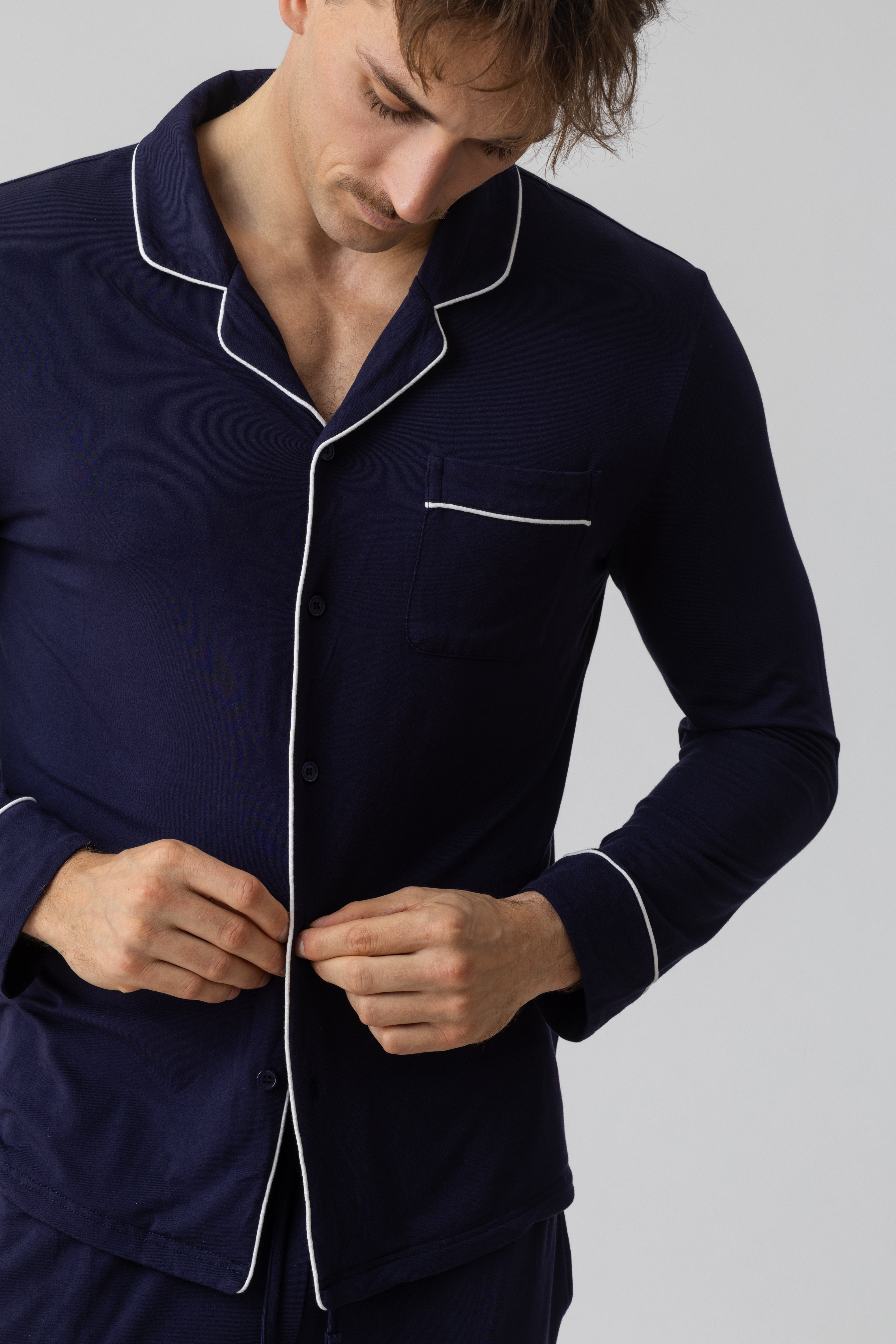 Detail of Harbour modal pajama shirt – navy fabric with white piping