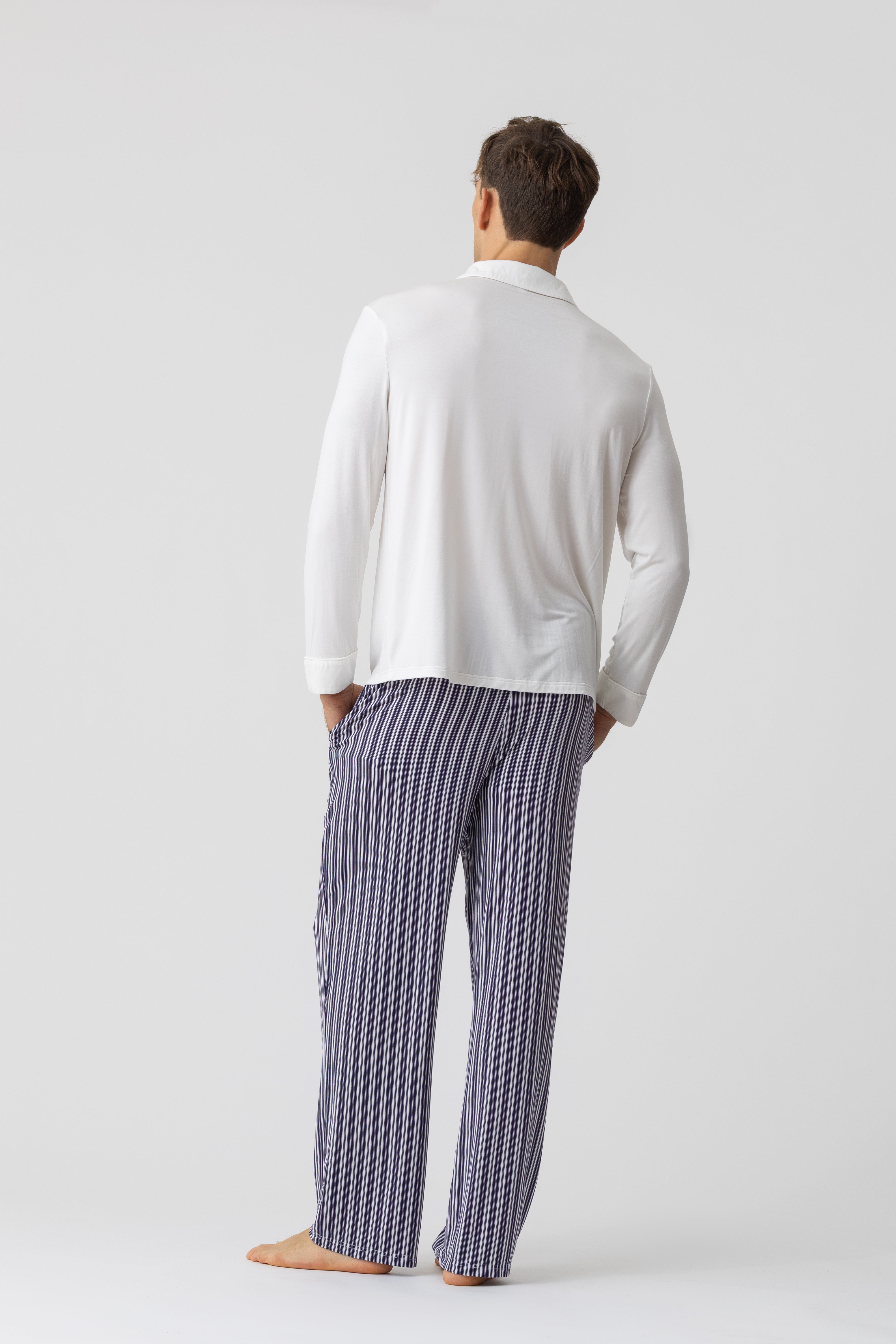 Men’s modal pajama set by Harbour – white shirt and navy pinstriped pants, back view